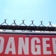 danger sign dangers of asbestos scaled