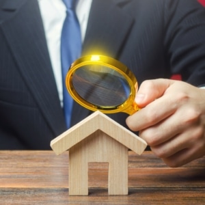 looking at model house with magnifier - does a home inspection affect the appraisal