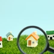 small houses under a magnifying glass real estate 2022 09 30 15 16 41 utc